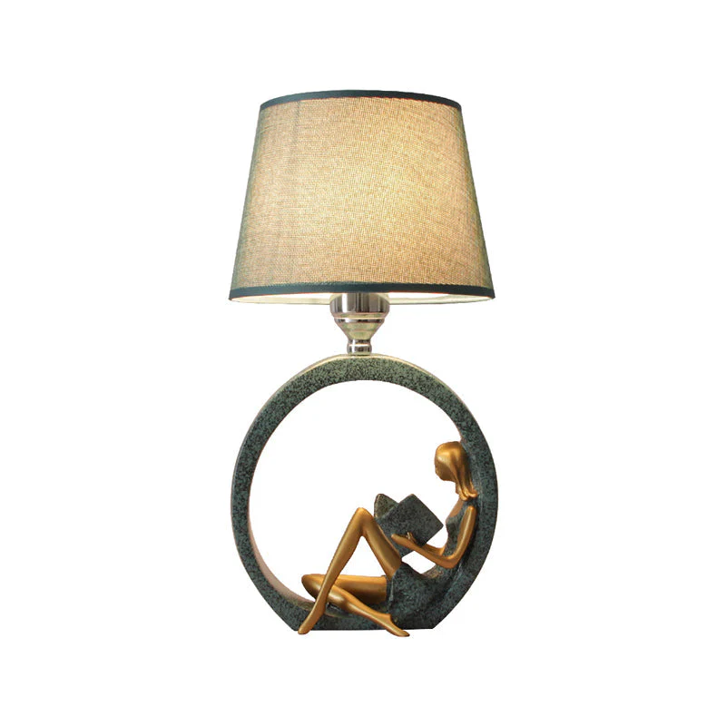 Blue Table Lamp with Girl Reading Figure - Image 3